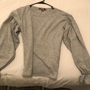 Grey statement sleeve top.